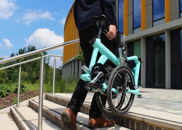 - FLITBike LightweightEbike CarryUpstairs HighRes